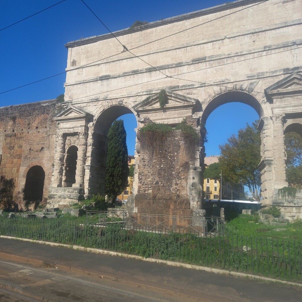 Arches in Rome near tram line